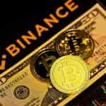 Binance, dollar bill en cryptocurrencies.